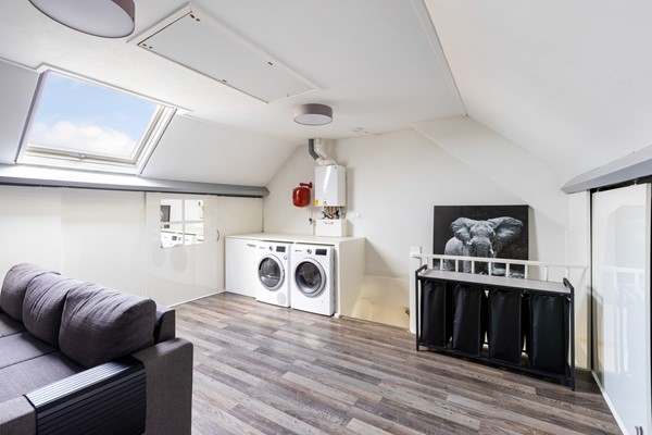 Foto - Te koop:  Verzorgde tussenwoning in Fijnaart!